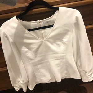 Designer top by Tibi with ruffle sleeves!!